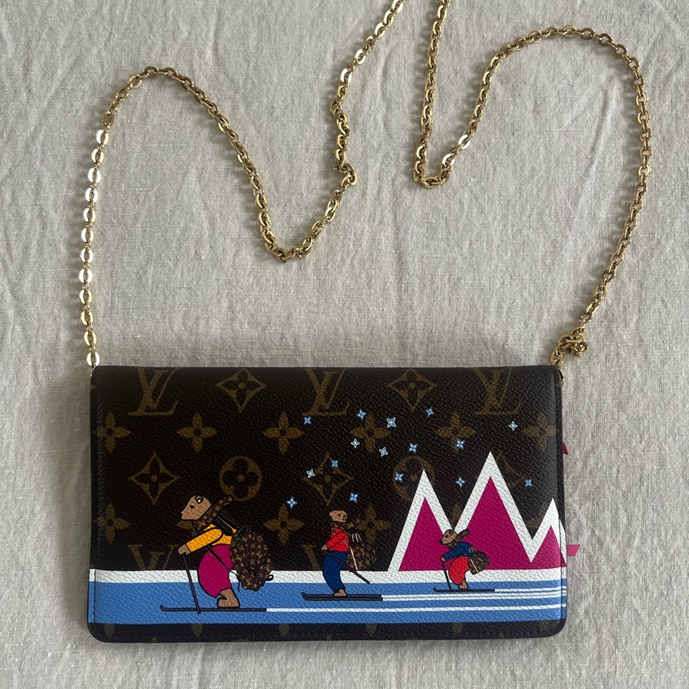 SOLD Louis Vuitton Limited Edition Christmas Animation Weekend Pochette